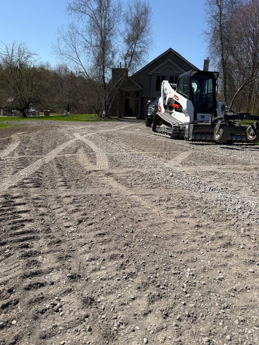 Gravel driveway refinished and regraded by T&R Land Pros