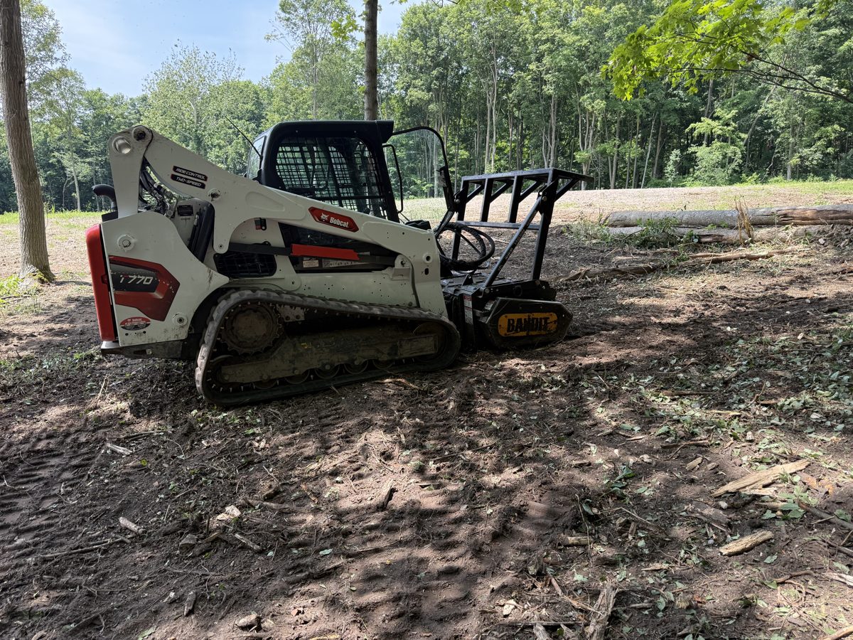 T&R Land Pros forestry mulcher clearing land in Cicero, NY