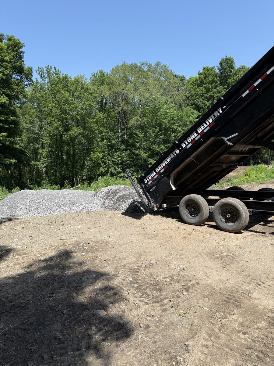 Stone driveway gravel delivered by T&R Land Pros dump trailer